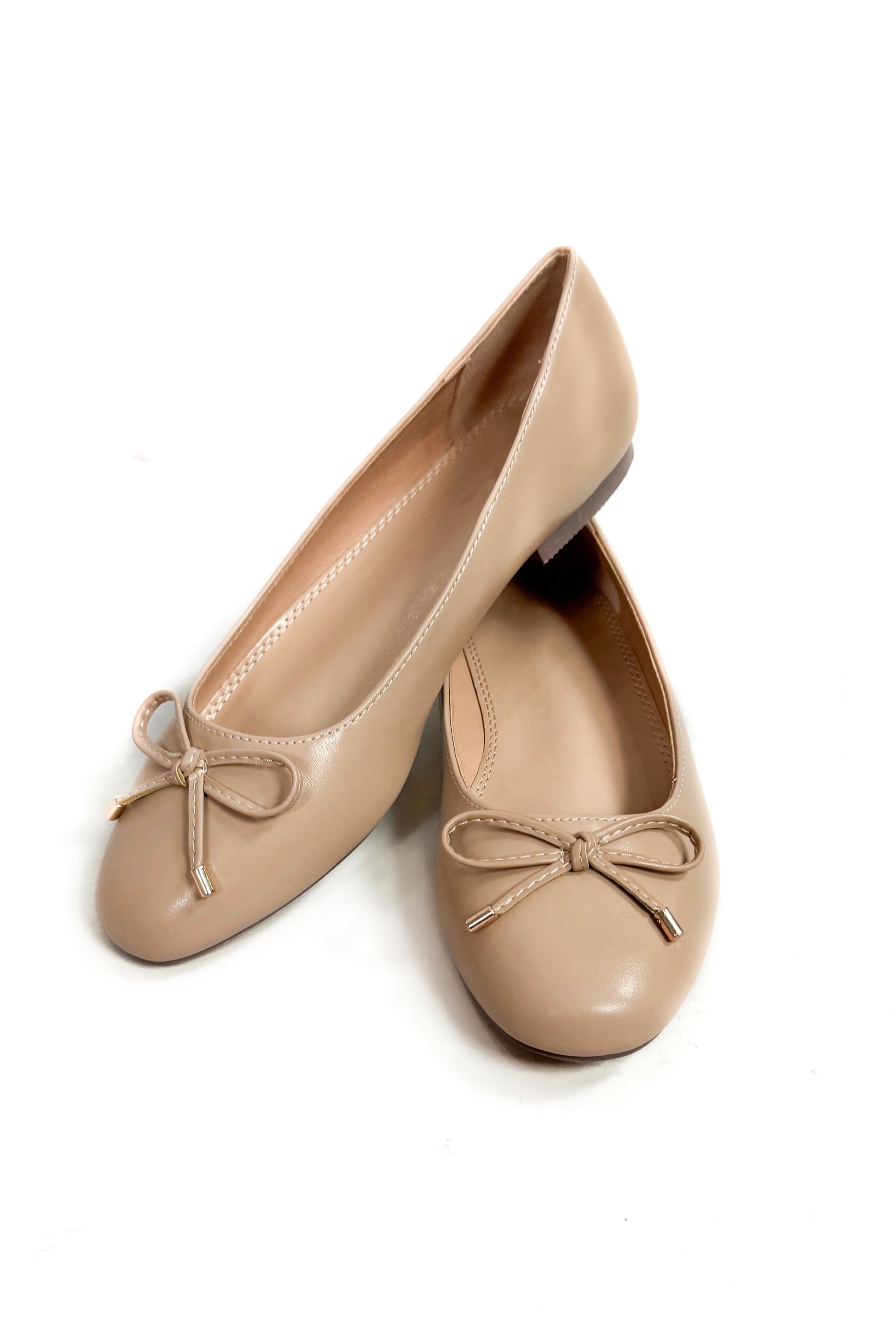 She s a Classic Ballet Flat in Nude