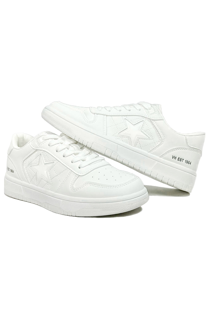 all white athletic sneakers with quilted detailing and a star patch