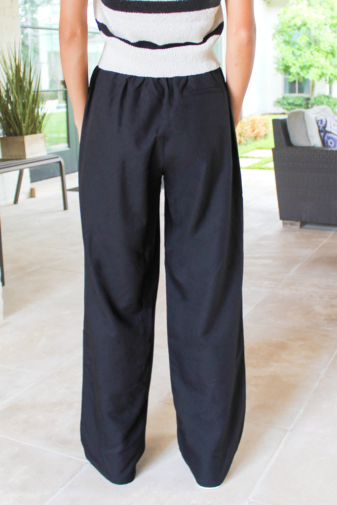 black pleated elastic waist slacks