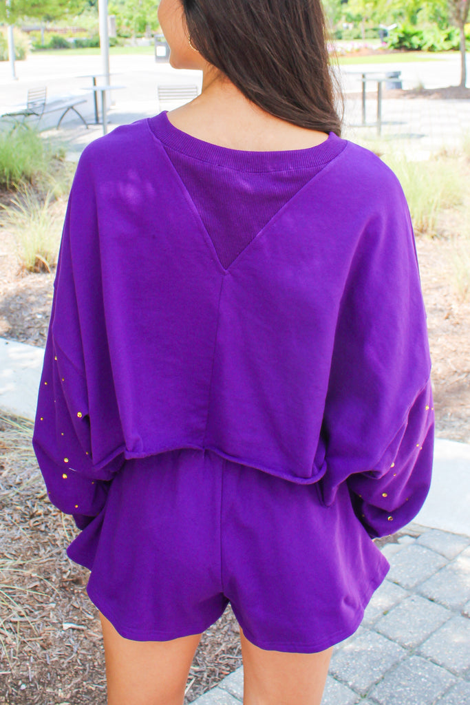 purple cotton cropped sweatshirt with gold rhinestone studs on sleeves