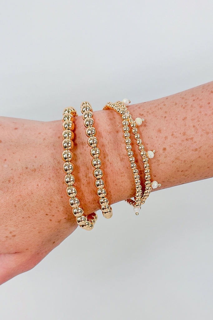 gold bracelet set with stone details