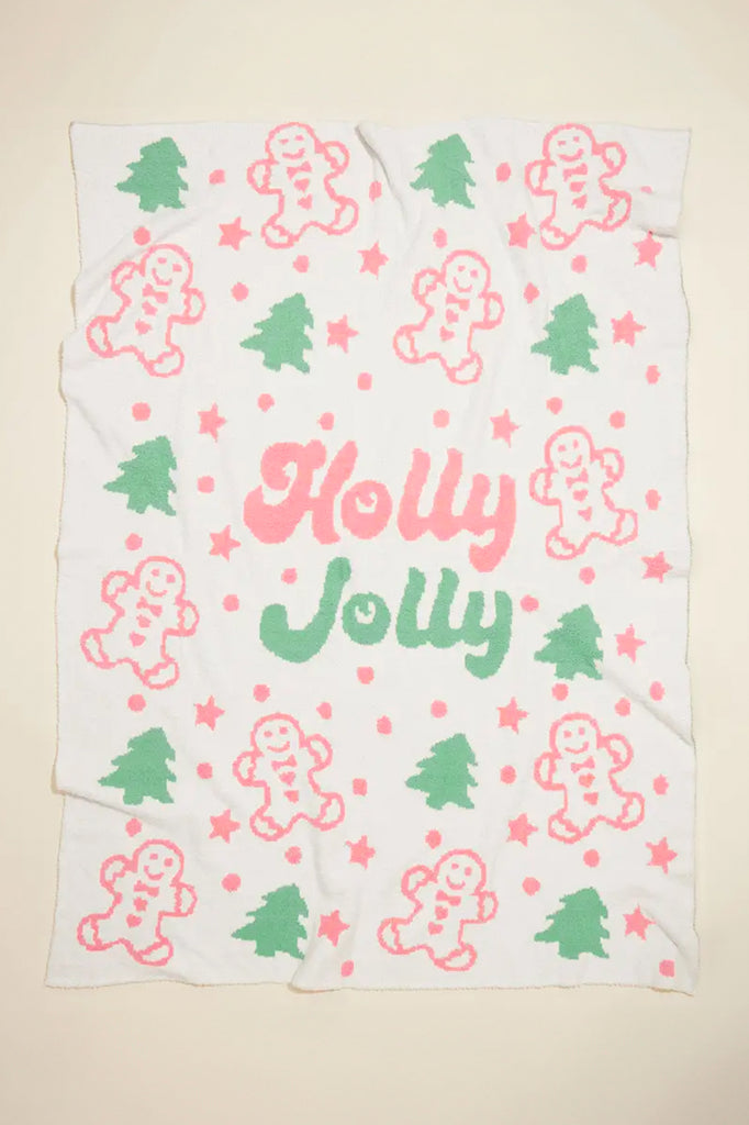 holly jolly lettering on blanket