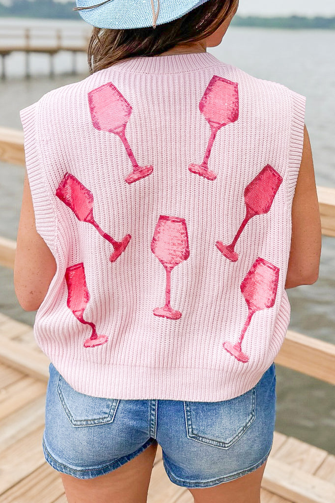 light pink sweater vest with pink, red, white and blue pearl lettering and sequin wine glass decals by queen of sparkles