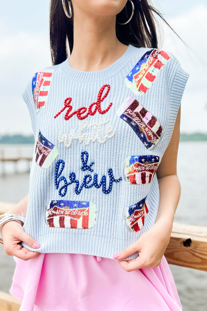 light blue sweater vest with red, white and royal lettering and sequin beer can patches, by queen of sparkles