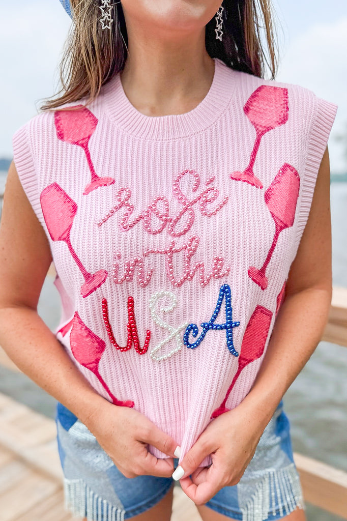 light pink sweater vest with pink, red, white and blue pearl lettering and sequin wine glass decals by queen of sparkles