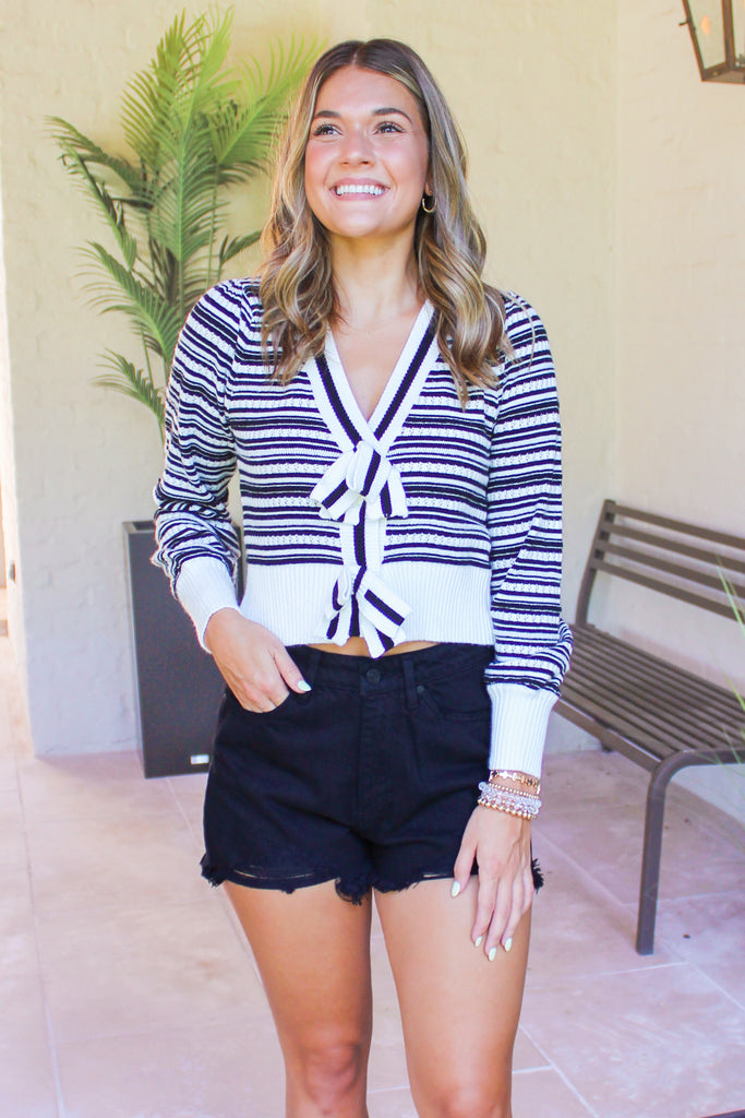 black and white stripe knit sweater with 2 front bows 